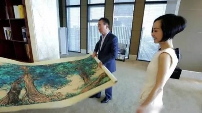 王健林为什么非常推崇画家石齐？